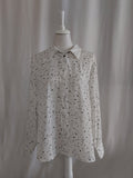 Gemusterte Bluse in Weiß mit schwarzem Print